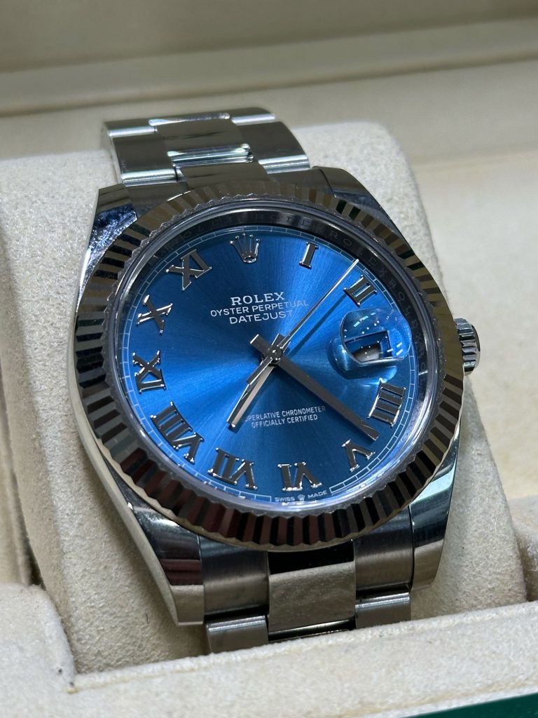 A watch being refinished by hand at Alpha Group in Hatton Garden
